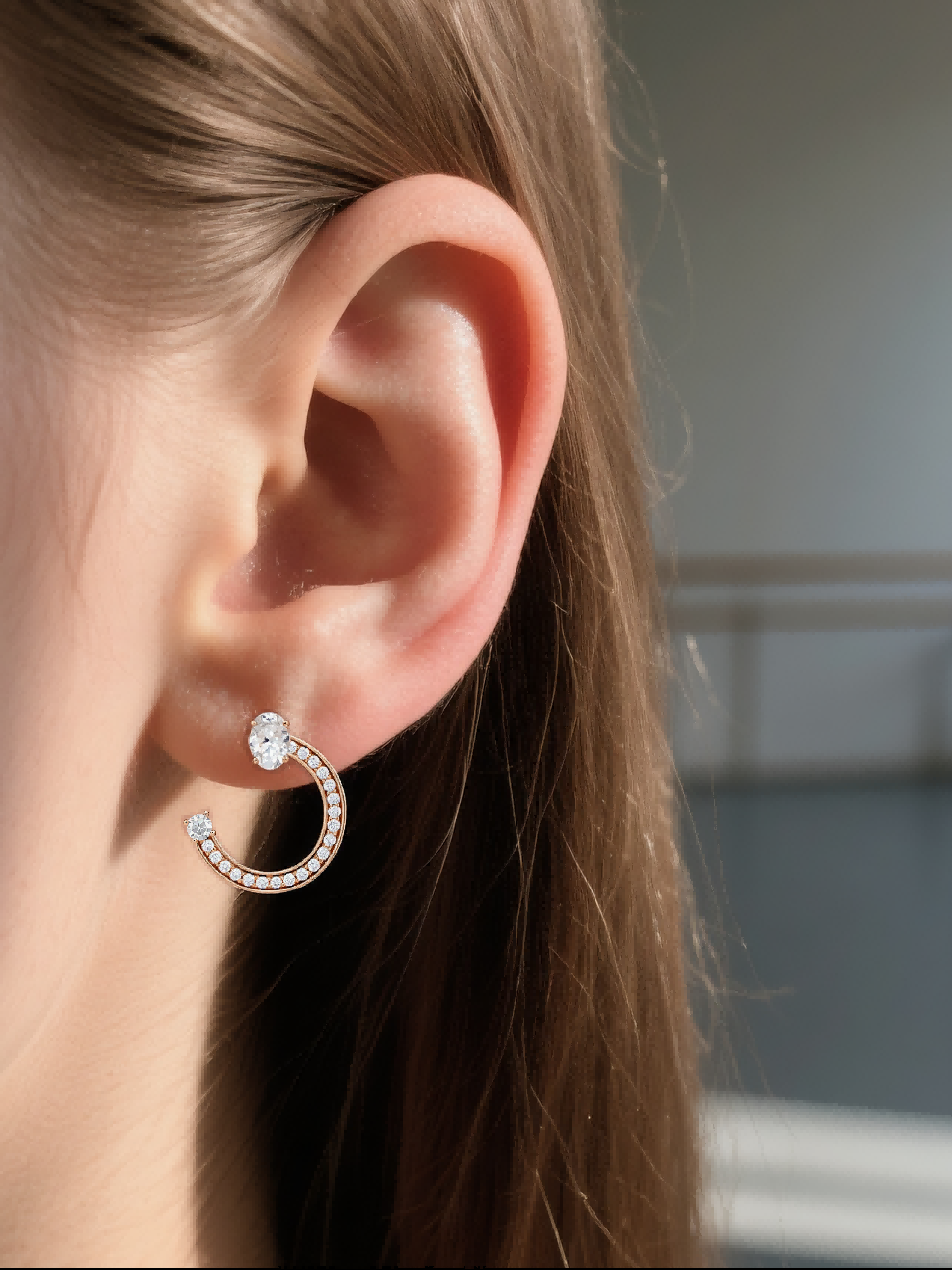 Own Your Bloom rose gold fashion earrings styled on soft sand with warm light, lifestyle scene, Los Angeles.