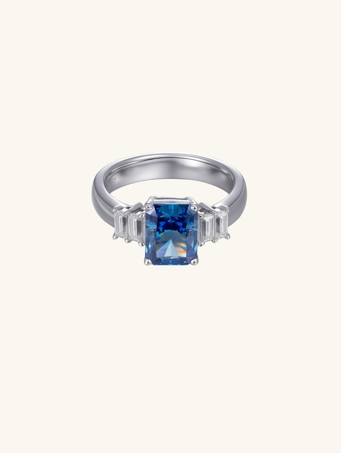 Own Your Bloom Blue Sapphire Baguette Ring displayed in jewelry box under soft light, symbolizing modern refinement, Miami.