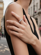 BuzzBloom customer styling infinity diamond band outdoors in urban setting, chic women’s everyday ring