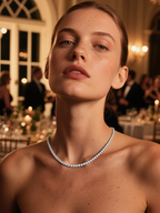 BuzzBloom customer styling silver tennis chain at formal dinner, modern women’s necklace fashion