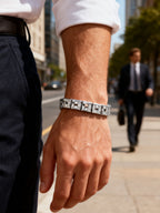BuzzBloom customer wearing BuzzBloom luxury architectural crystal grid bracelet in outdoor lifestyle scene, modern men’s accessory