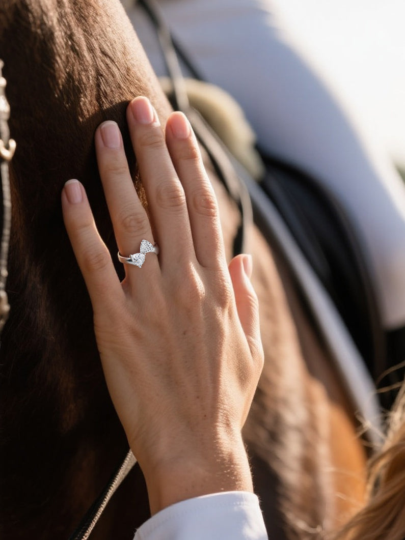 Customer showcasing BuzzBloom trillion bypass engagement ring close-up hand shot, elegant women’s jewelry