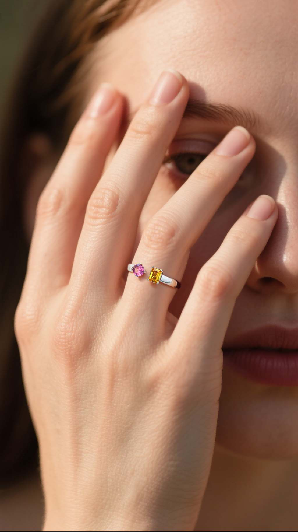Customer wearing BuzzBloom colorful gemstone cocktail ring at outdoor dinner, for women