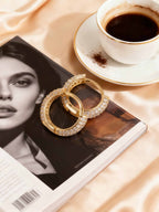 Hand-selected diamonds closeup in Bloomira 14K gold hoop earrings - NYC quality jewelry