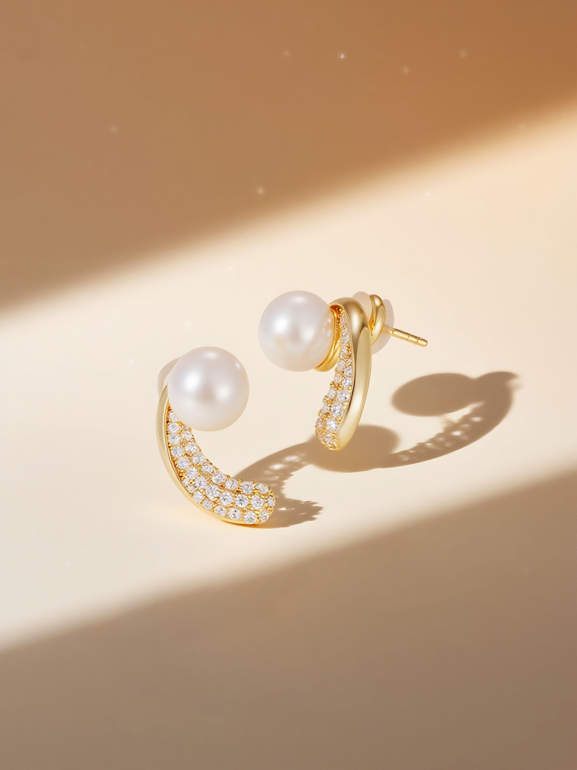Own Your Bloom pearl and diamond stud earrings, soft-shadow lifestyle setup, Miami USA.