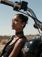 Own Your Bloom hexagonal cross diamond earrings on man with graffiti city backdrop, bold street fashion style, Chicago.