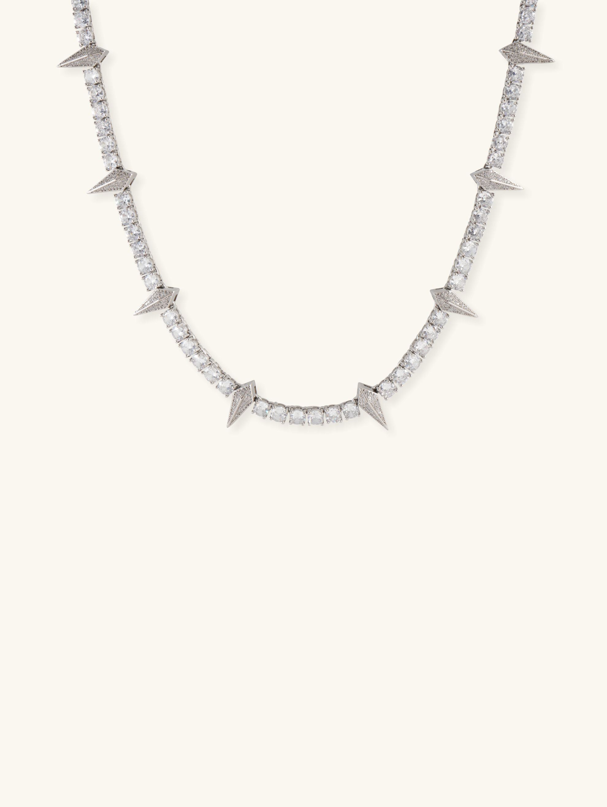 Own Your Bloom 14K diamond leopard claw tennis chain necklace in white gold, white background, New York USA