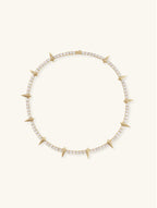 Own Your Bloom 14K diamond leopard claw tennis chain necklace, yellow gold on white, Los Angeles USA