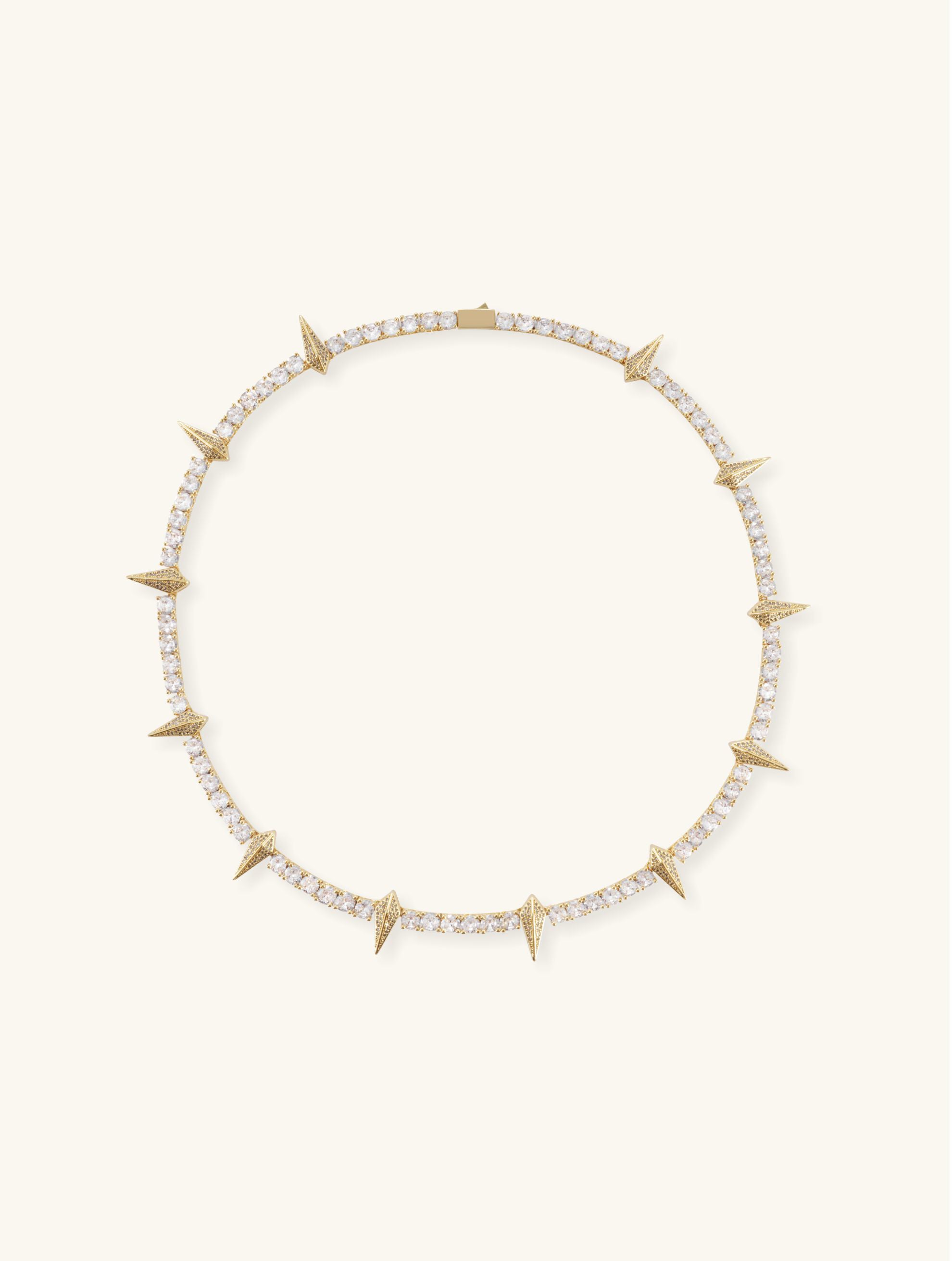 Own Your Bloom 14K diamond leopard claw tennis chain necklace, yellow gold on white, Los Angeles USA