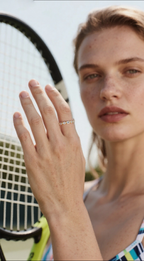 Own Your Bloom 14K diamond patch ring worn by woman on tennis court, elegant active lifestyle jewelry, New York.