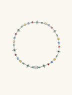 Own Your Bloom 14K gold gemstone necklace detailed shot with emerald, ruby, and sapphire accents, Chicago.