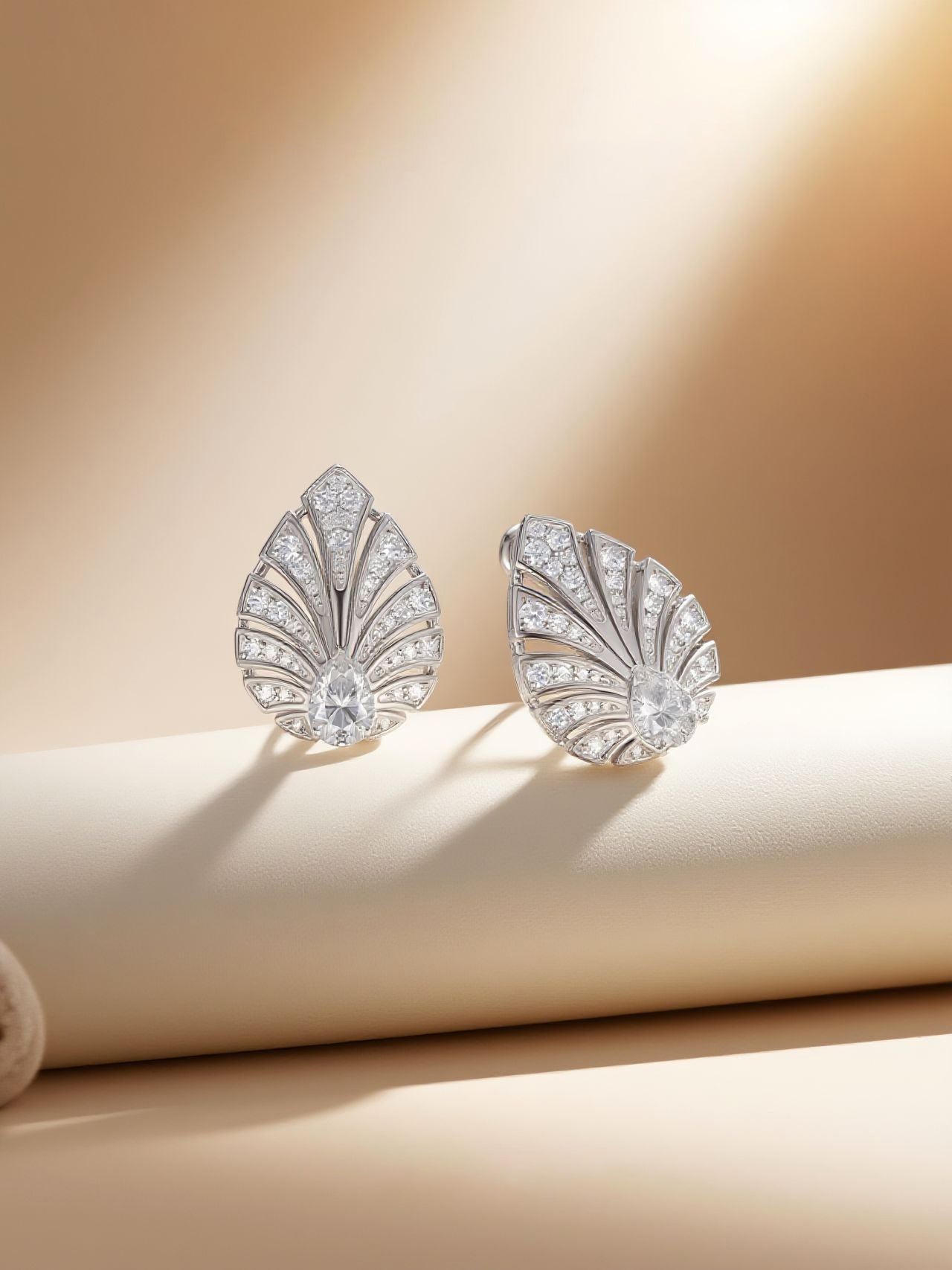own your bloom 14K white gold pavé diamond earrings displayed on pedestal edge, studio lifestyle, Miami FL