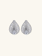 14K white gold pavé diamond leaf studs by own your bloom, angled pair on clean white, Chicago IL