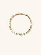 Own Your Bloom 14K rainbow diamond bracelet close-up showing multicolor sapphire and gold clasp detail, Chicago.