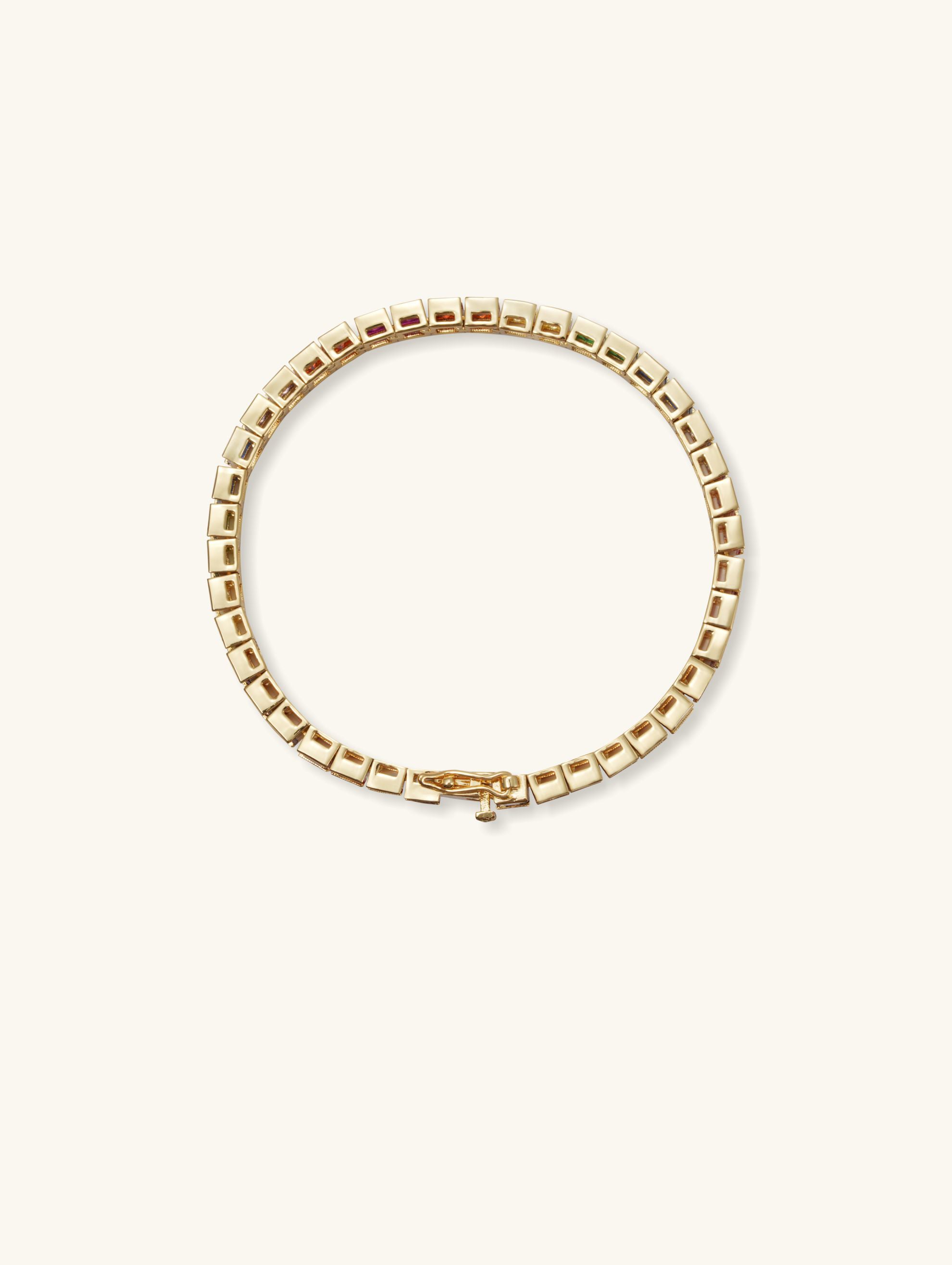 Own Your Bloom 14K rainbow diamond bracelet close-up showing multicolor sapphire and gold clasp detail, Chicago.