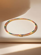 Own Your Bloom 14K rainbow diamond necklace in soft studio light with minimal backdrop, Miami.