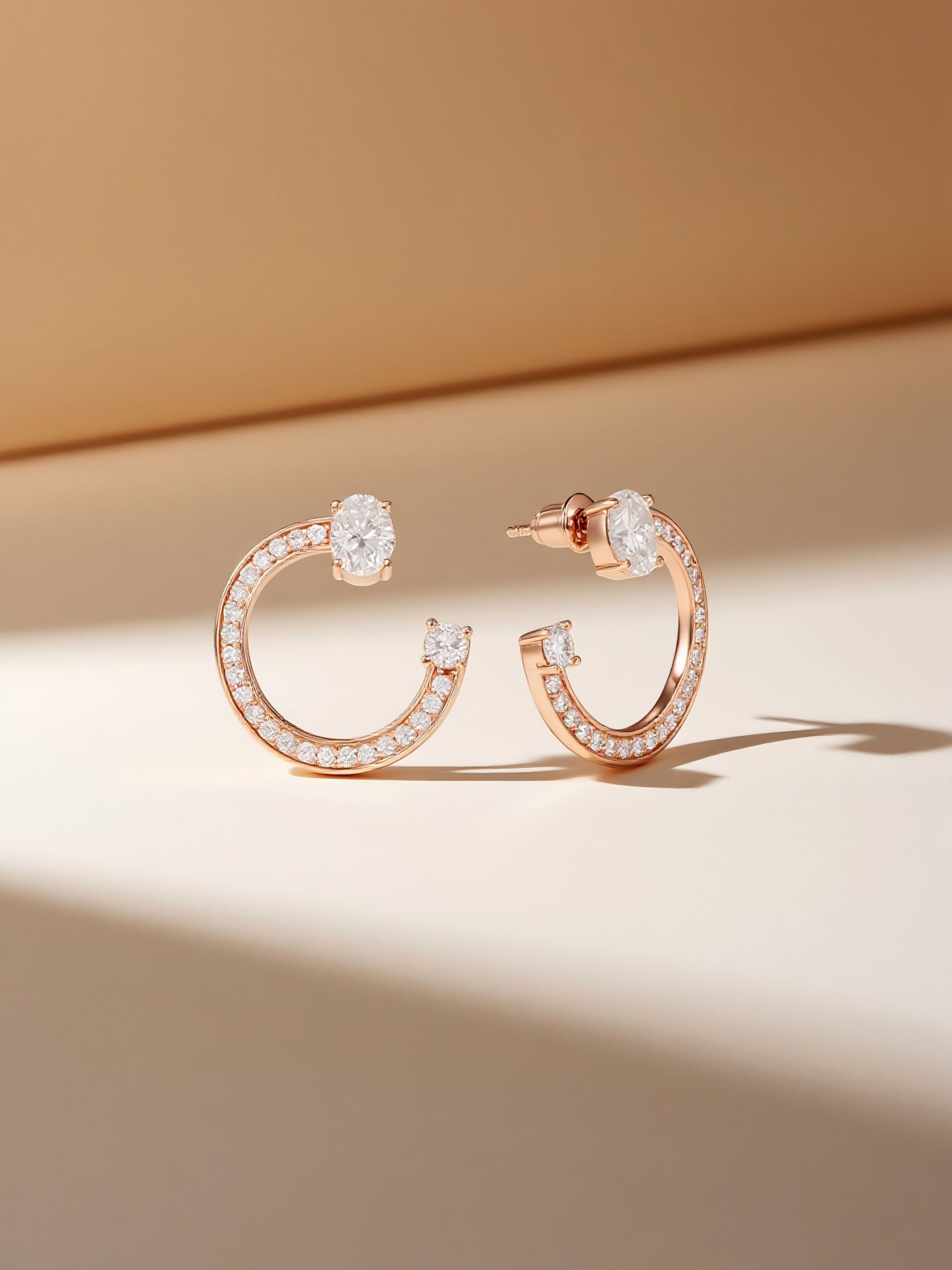 Own Your Bloom rose gold open circle earrings on minimal backdrop, lifestyle composition, Seattle.