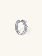 Own Your Bloom 14K white gold marquise diamond hoop earrings, open clasp angled view on white background, Seattle.