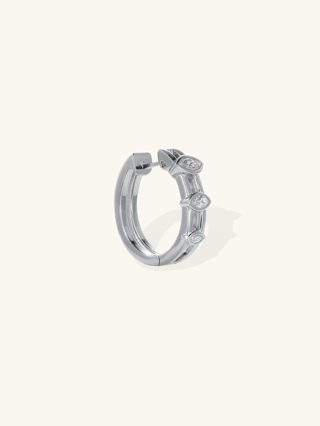 Own Your Bloom 14K white gold marquise diamond hoop earrings, open clasp angled view on white background, Seattle.