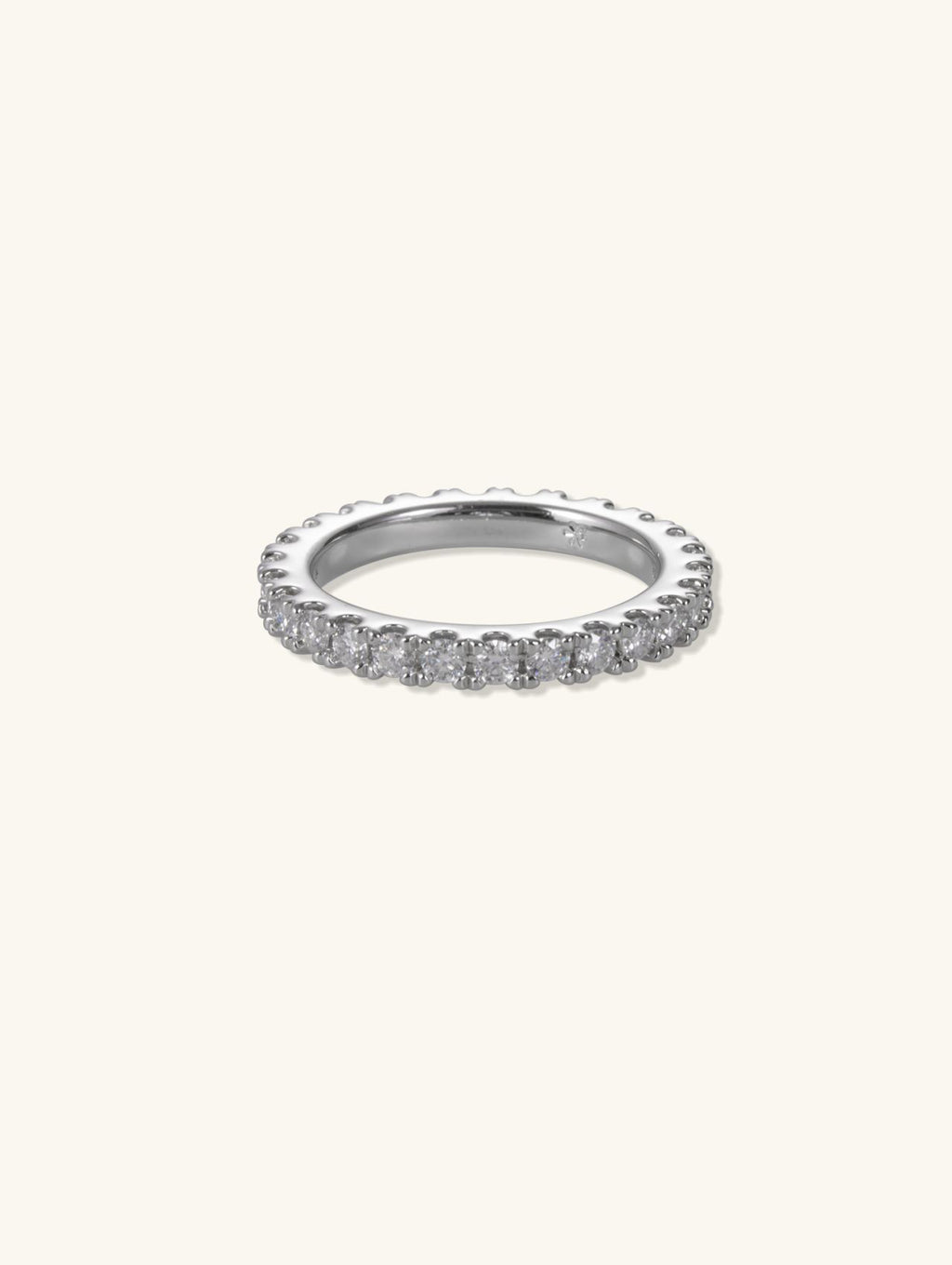 Own Your Bloom 14K white gold slim pavé diamond band, front angle on white background, New York.