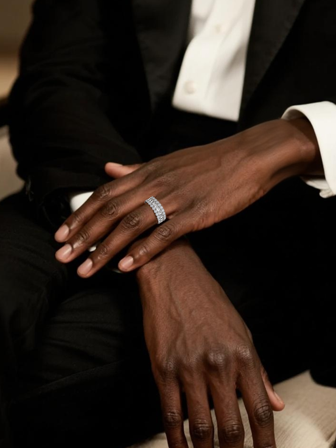 Own Your Bloom 14K wide diamond ring on man’s hand, elegant formalwear styling, modern jewelry for men, Chicago.