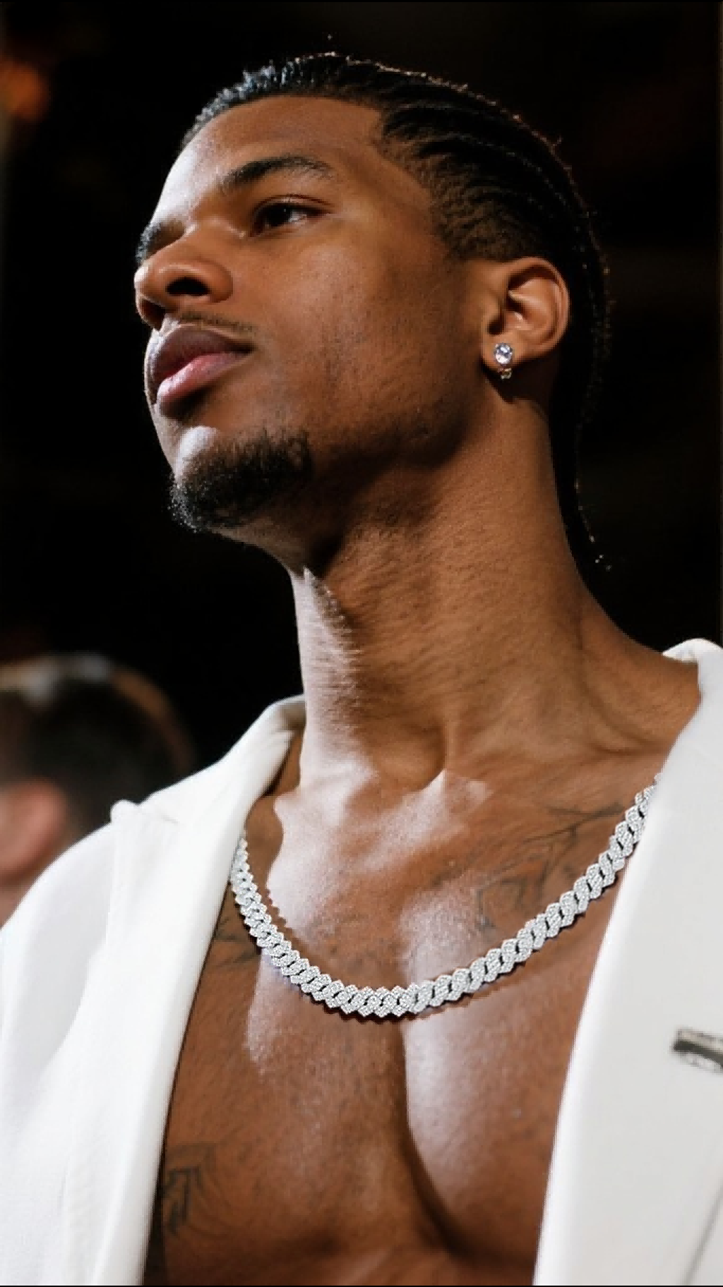 Own Your Bloom 14mm diamond Cuban link chain worn by man at night event, modern luxury street style, Atlanta.