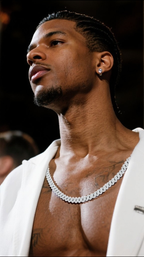 Own Your Bloom 14mm diamond Cuban link chain worn by man at night event, modern luxury street style, Atlanta.