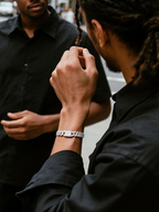 Own Your Bloom 14K diamond Cuban bracelet worn by man in social scene, luxury men’s jewelry lifestyle, Los Angeles.