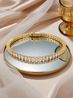 Elegant scene of Own Your Bloom 4mm Diamond 14K Tennis Bracelet on mirror with florals; Miami, Houston, Dallas.