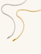 Own Your Bloom tennis chain in yellow and white 14K gold with diamonds, luxury minimalist jewelry shot, San Francisco.