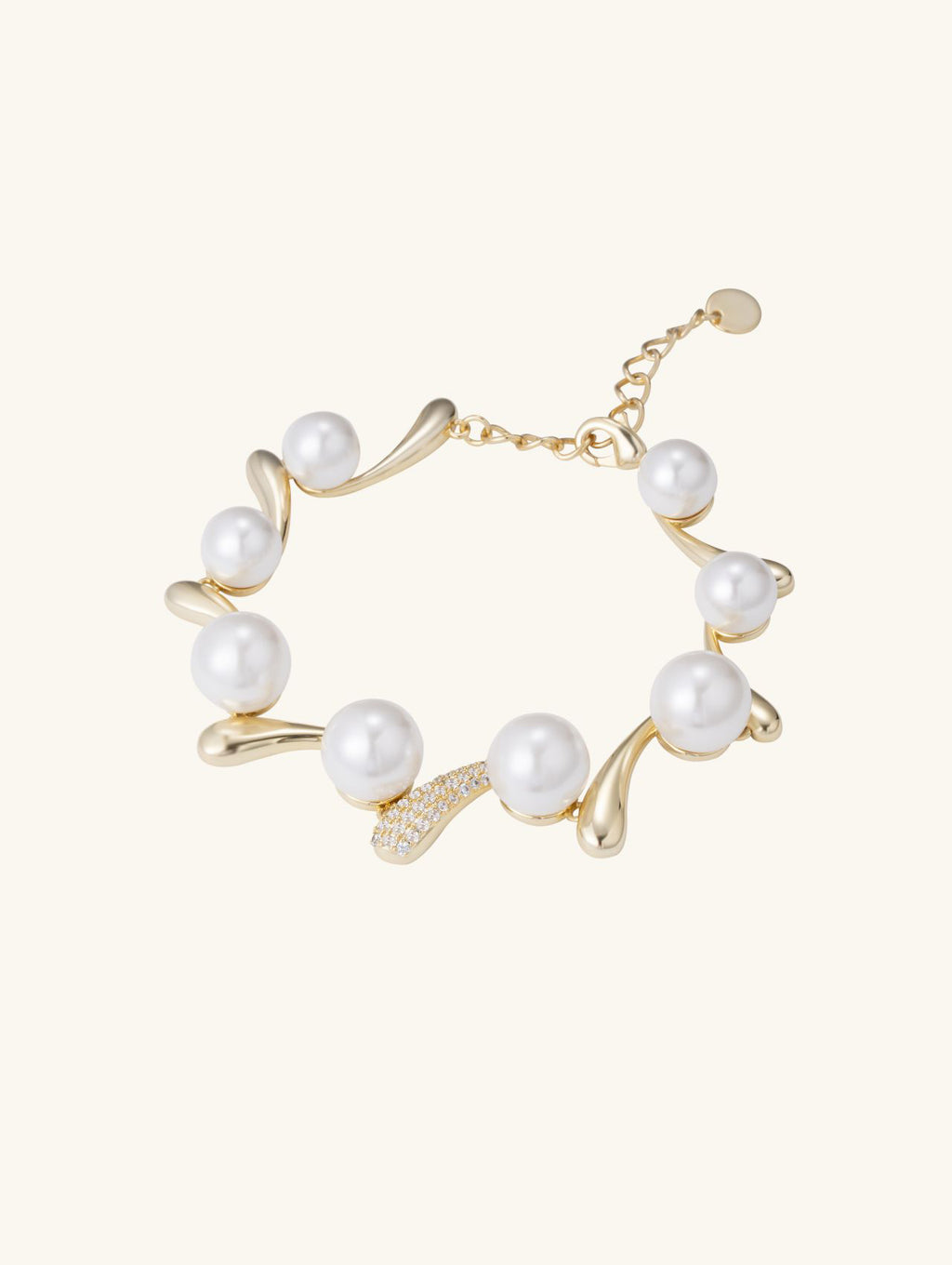 Close-up of Own Your Bloom Australian white shell pearl 14K diamond bracelet details on white background, New York jewelry.