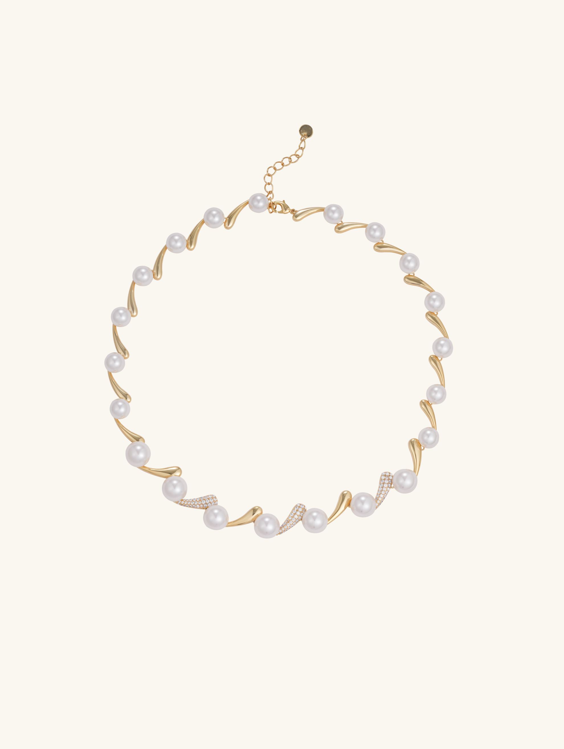 Own Your Bloom 14K gold necklace with Australian white shell pearls and diamond accents, detailed close-up view, Chicago.