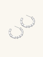 Own Your Bloom moissanite baguette hoop earrings close-up detail highlighting clean lines and high-polish white gold, Chicago.