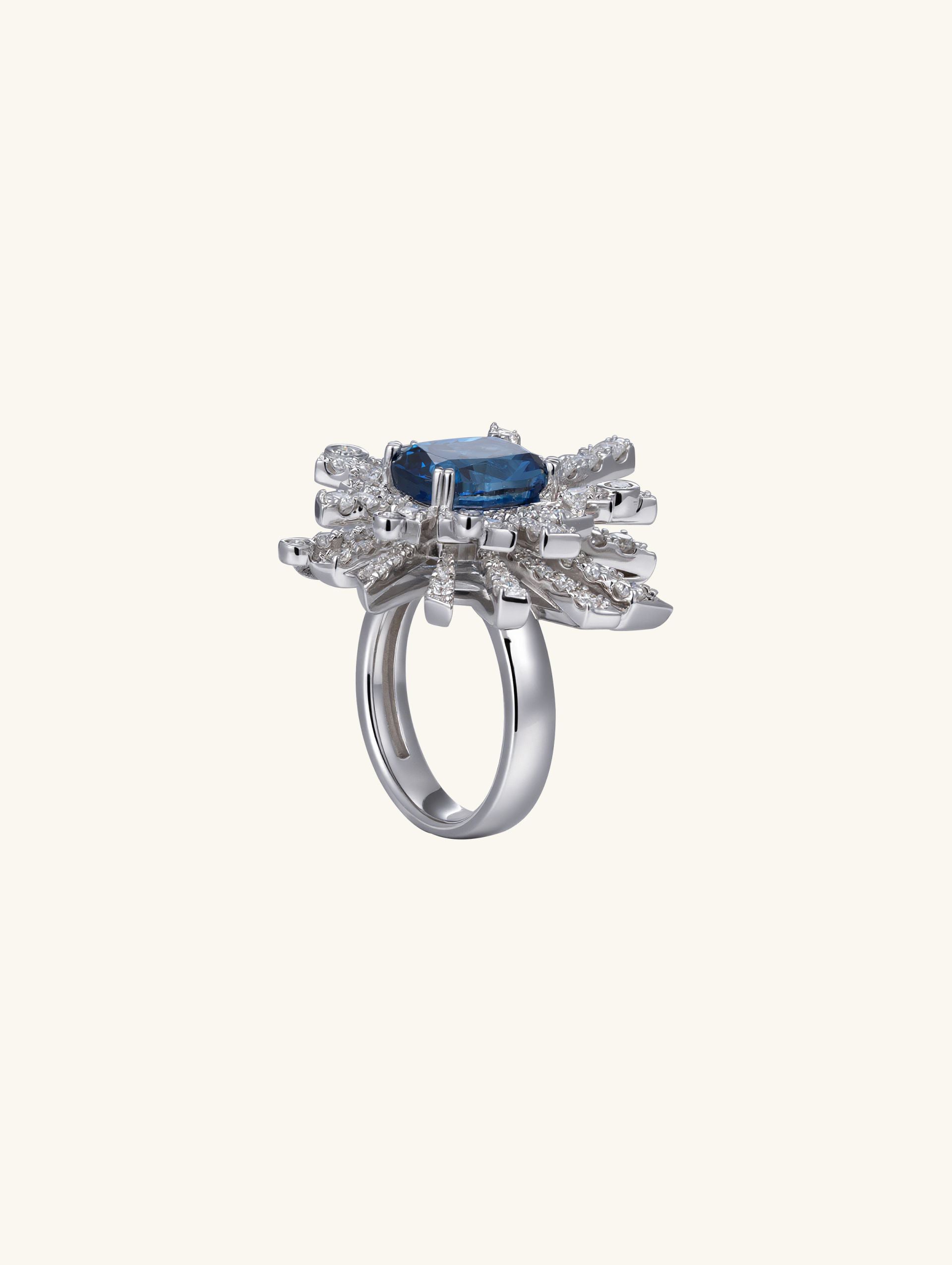 Own Your Bloom Blue Sapphire Flower Ring top view showing elegant halo of sparkling diamonds around vivid blue sapphire, Chicago.