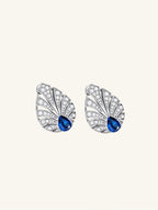 Own Your Bloom Brilliant Gleam sapphire earrings top view highlighting Art Deco-inspired symmetry and white gold brilliance, Chicago.