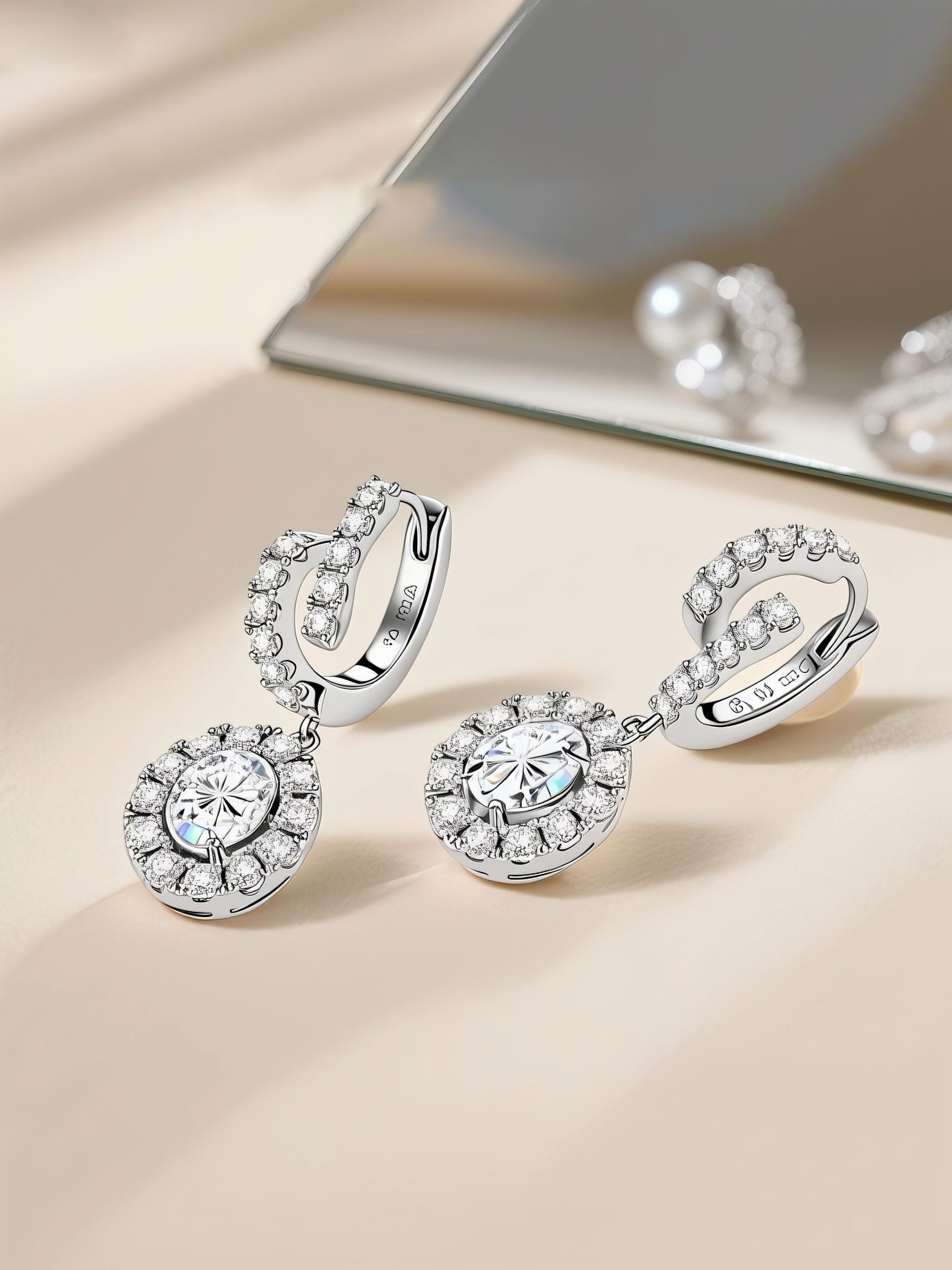 Own Your Bloom 14K round treasure diamond earrings displayed in soft light luxury studio with reflection, Los Angeles.