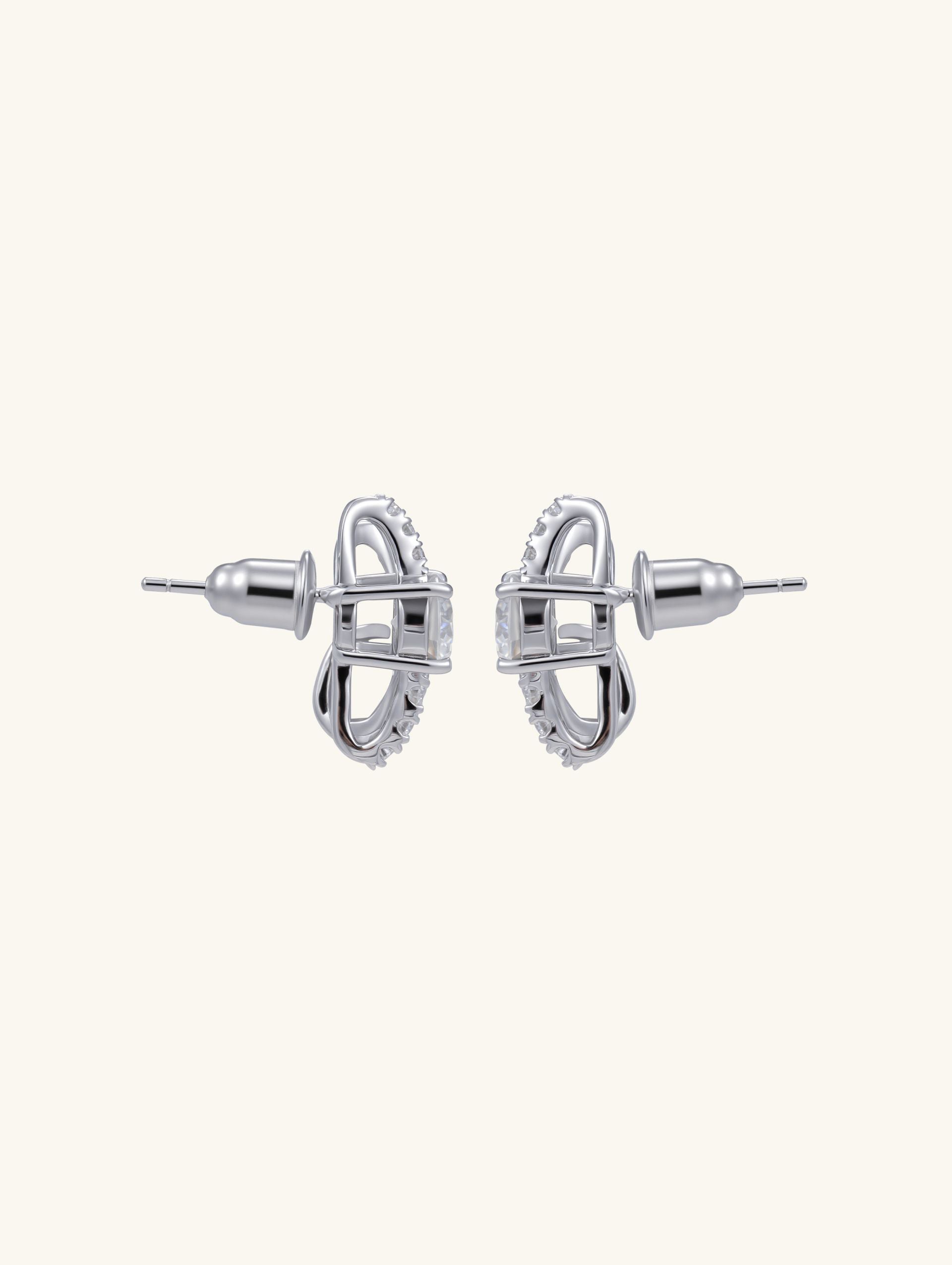Own Your Bloom Crystal Ribbon Earrings top view featuring double arc silver bands and premium zircon sparkle, Chicago.