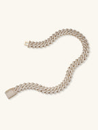 Own Your Bloom 14K Cuban chain close-up showing diamond-set links and polished finish, handcrafted luxury jewelry, San Francisco.