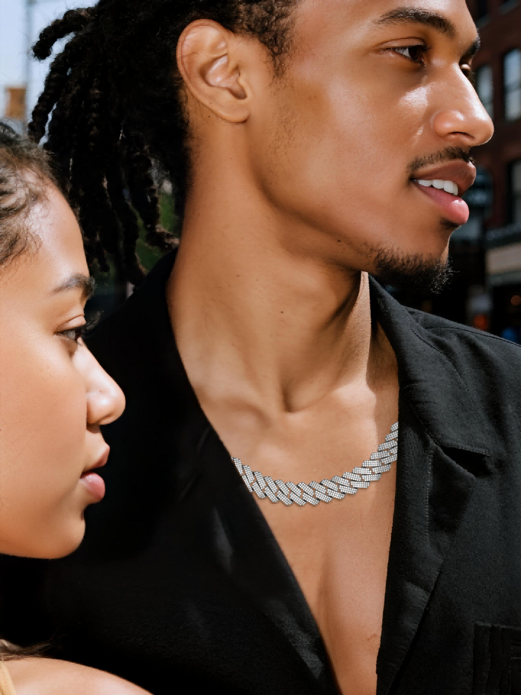 Own Your Bloom 14K gold diamond Cuban chain worn by man at nightlife event, high-end luxury accessory, Los Angeles.