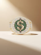 Studio hero of Own Your Bloom 14K gold-plated dollar sign ring with green pavé center and halo detail.