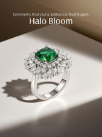 Own Your Bloom emerald and diamond halo ring in soft light with elegant shadow detail, Dallas.