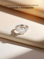 Own Your Bloom emerald-cut diamond engagement ring, lifestyle product shot with warm sunlight, Miami.
