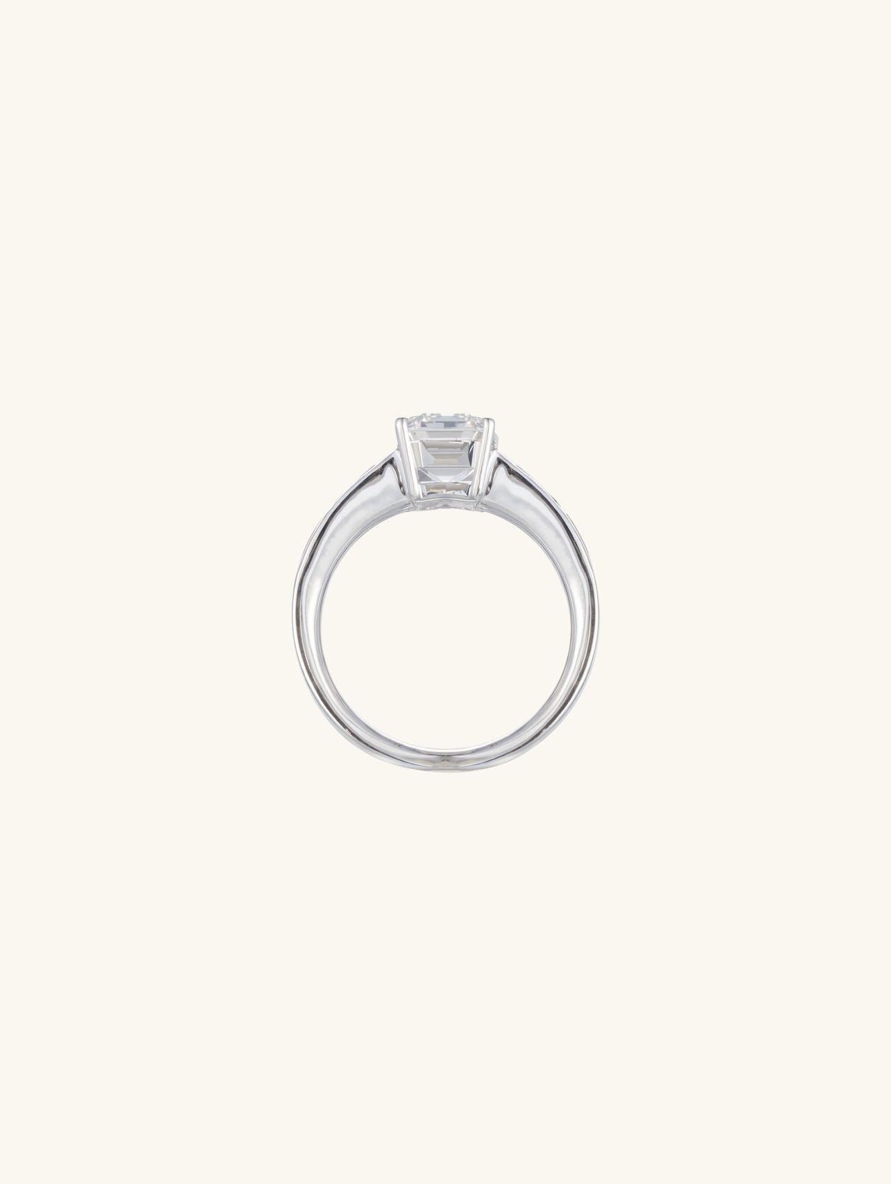 Own Your Bloom emerald-cut diamond engagement ring, top view showing tapered baguette details, Chicago.
