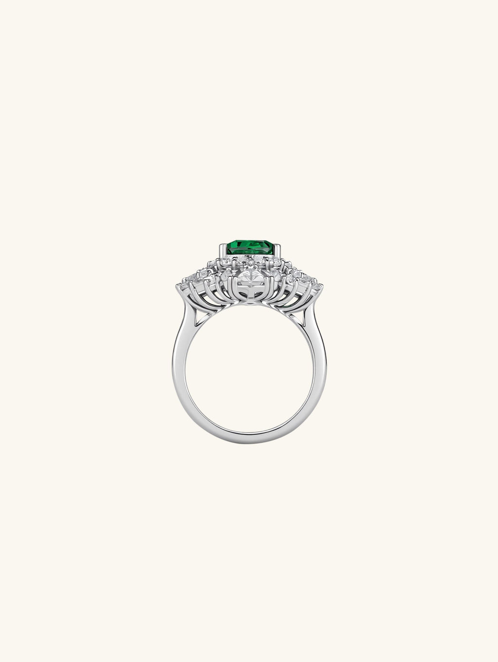 Own Your Bloom emerald and diamond halo ring detailed craftsmanship and silver band jewelry design, Chicago.