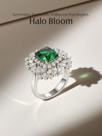 Own Your Bloom emerald halo ring luxury jewelry display under natural light reflection, Boston.
