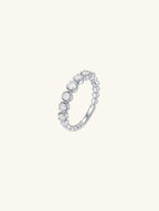 Own Your Bloom diamond eternity ring detailed view highlighting craftsmanship and classic round-cut brilliance, Chicago.