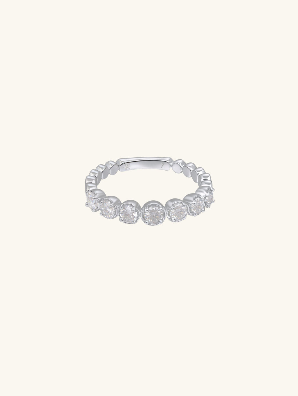 Own Your Bloom Endless Allure diamond eternity band front view with round cut diamonds and silver setting, New York.