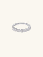 Own Your Bloom Endless Allure diamond eternity band front view with round cut diamonds and silver setting, New York.