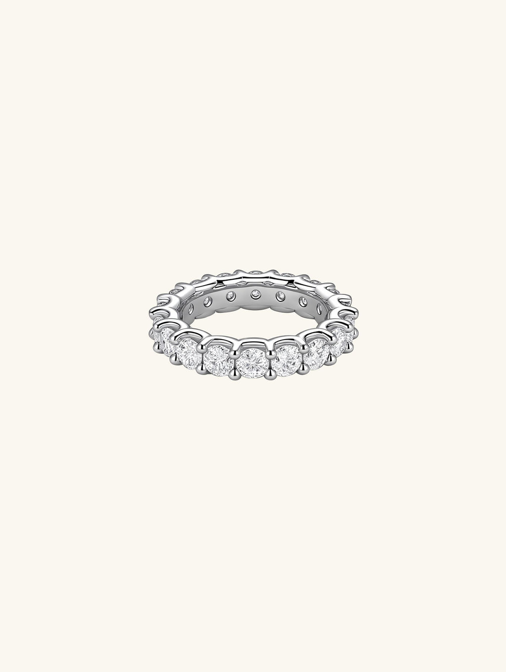 Own Your Bloom Full Eternity Diamond Band Ring front view showing continuous round-cut diamonds in sleek silver setting, New York.

