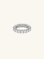 Own Your Bloom Full Eternity Diamond Band Ring front view showing continuous round-cut diamonds in sleek silver setting, New York.
